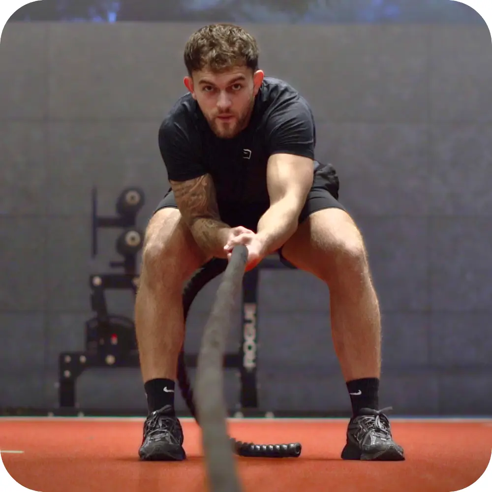 Toby Forder training with battle ropes